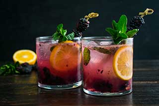 Mocktail with Fruit and Herb Garnish