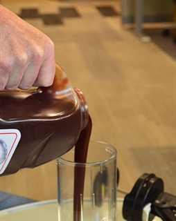 Pouring product into ProPortion Pouring product into ProPortion